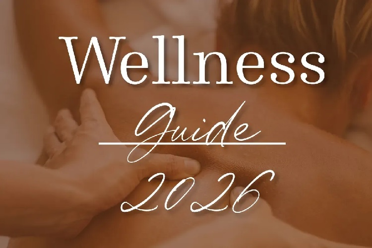 Close-up of a person receiving a relaxing back massage with overlay text reading "Wellness Guide 2026," representing a Fort Wayne Health resource.