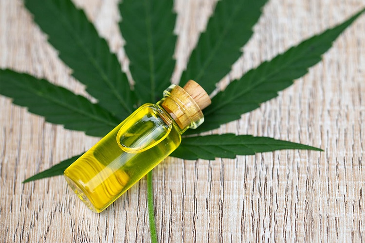 CBD benefits concept image showing CBD oil bottles, natural hemp leaves, and wellness icons highlighting relaxation, sleep support, stress management, and overall wellness.