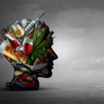Conceptual head silhouette filled with substances and a wind-up key, showing how addiction is a medical condition driven by brain changes.